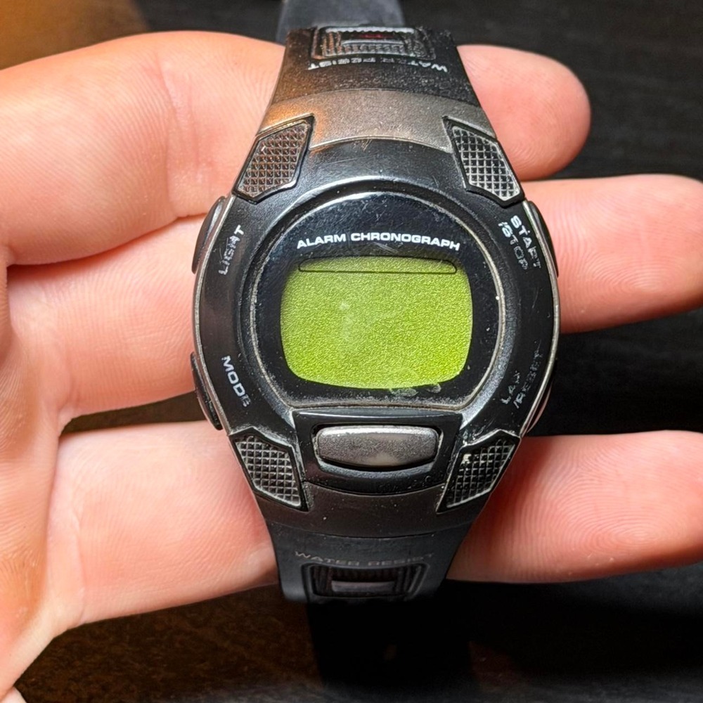 Black digital watch with green screen #digital #timepiece